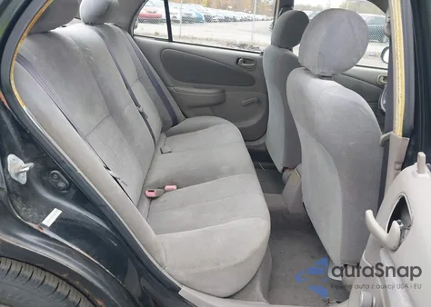 2002 Toyota Corolla Ce из США, поврежденный, VIN 2T1BR12E92C521983